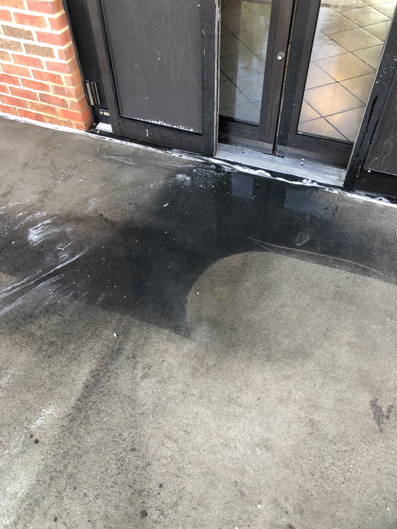 Commercial storefront concrete before and after